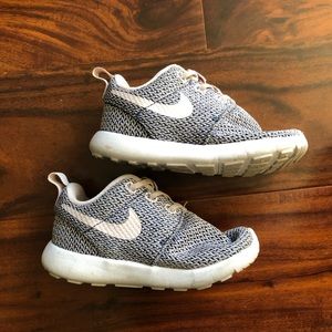 8c light pink and gray Nike sneakers